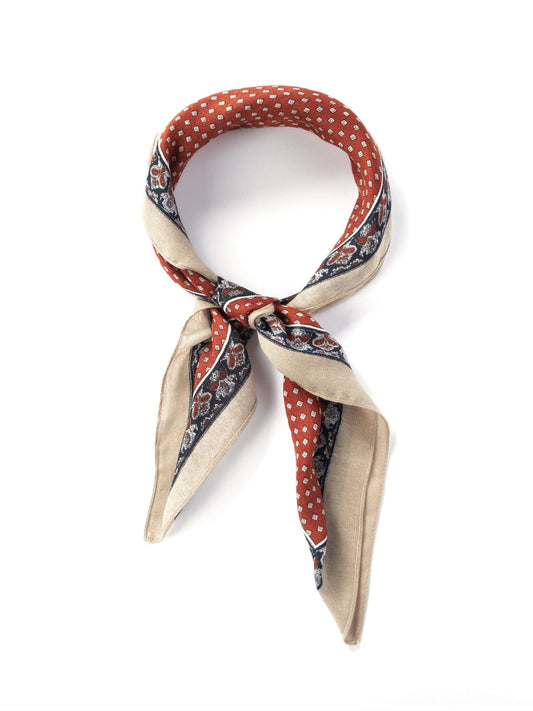 Neck scarf with red dot and beige patterns on a white background